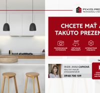 A kitchen with an island and cabinets, offering a service for a real estate presentation of a two-room apartment.