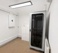 Distribution cabinet and cabinets in an office with a wooden decor floor.