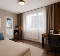 A spacious room in a 3-room apartment with a desk and a floor with a wooden decor.