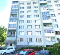 Apartment building on Ostravská Street in Košice, Juh district, with a parking lot.