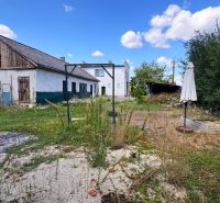 A family house on Jarná Street in Novosad with a grassy and concrete garden.