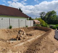 A yard with an excavation and a pile of bricks on the Recreational Grounds in Selešťany in Záhorce.