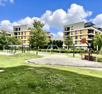 A complex of modern apartment buildings surrounded by a park on Bajkalská in Bratislava - Ružinov.