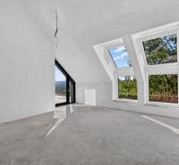 Attic room with large windows in a 5 or more room apartment, white paint.