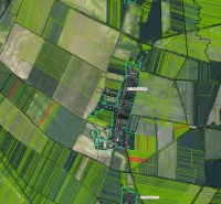 Aerial view of agricultural and forest lands around Pečeňady.