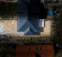 Aerial view of a family house on Trnavská Street in Nitra with landscaped surroundings.