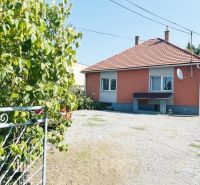A family house on Sabinovská Street in Prešov with a landscaped yard and garden.