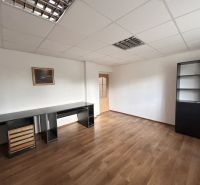 Office in a family house with a wooden decor floor and furniture.