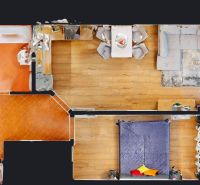 Floor plan of a 2-room apartment with wood-patterned flooring and a hallway with tiles.