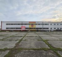 Production premises near Pezinská Street in Vinosady with a large paved courtyard.