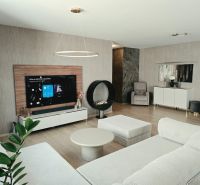 Living room in a 4-room apartment with a fireplace, sofa, and floor with wooden decor.