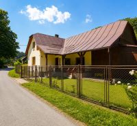 A family house in Makov on Čierne Street with a fence and a landscaped garden.