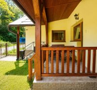 A family house in Čierne in Makov with a terrace and yard in a summer setting.