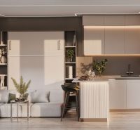 Interior of a family house with a kitchen, living area, and wooden decor flooring.