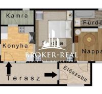 Floor plan of a family house with two bedrooms, a kitchen, and a terrace.