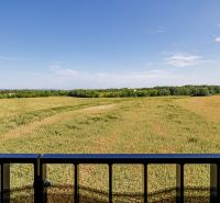 View from the balcony of a vast field near Bratislava in Petržalka on Fialová.