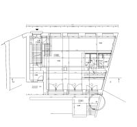 Floor plan of commercial spaces with staircase and technical rooms.