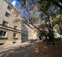 Apartment building on Miletičova Street in Bratislava - Ružinov, surrounded by trees and cars.