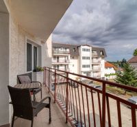 The balcony of a 3-room apartment on Podhorská Street in Banka with a view of the parking lot.
