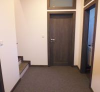 Interior doors with a dark frame in warehouses and halls.