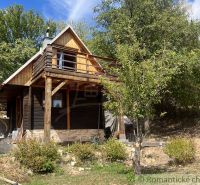 A cottage in Bratislava IV surrounded by trees in picturesque nature.