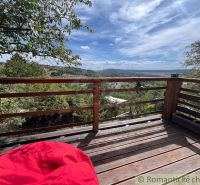 View from the terrace of the cottage in Bratislava IV with comfortable seating and natural surroundings.