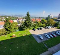 View from Gagarin Street in Zvolen to the parking lot and playground.