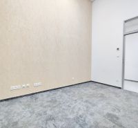 Offices with built-in drawers and carpeted floors, bright walls create a pleasant atmosphere.