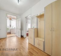 Interior of a family house with a wooden decor floor and light furniture.