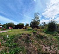 Plots - living in Jarabina with greenery, a fence, and a rural atmosphere.