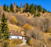 A cottage surrounded by autumn nature in the mountains near Banská Štiavnica.