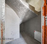 The interior of a family house with unfinished walls and electrical wiring.