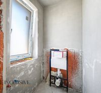 Construction work in the bathroom of a family house with preparation for sanitary installation.