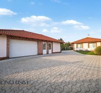 A family house in Kostolné Kračany near Dunajská Streda with a garage and a paved driveway.