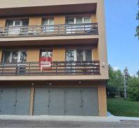 Apartment building with balconies and garages on Moyzesova Street in Pezinok, 4-room apartment.