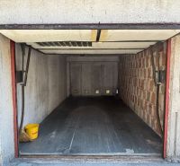 Open garage with wood decor flooring on Hanulova Street in Bratislava - Dúbravka.