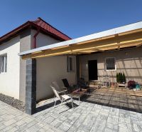 A family house on Hlavná Street in Bežovce with a spacious terrace and outdoor seating.