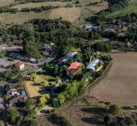 An aerial view of development plots in Slatinské Lazy surrounded by nature and fields.