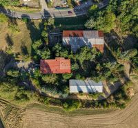 Aerial view of development plots with greenery in Slatinské Lazy.