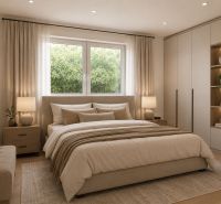 Bedroom with wood-patterned flooring, a comfortable bed, and a built-in wardrobe in a family house.