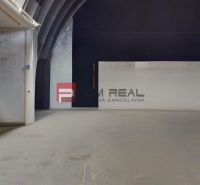 Empty office interior with white walls and concrete floor.