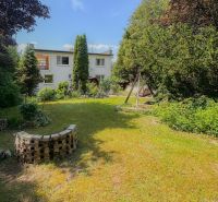 A family house in Sady nad Torysou surrounded by a spacious garden and greenery.