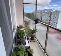 Balcony with flower pots and a view of the housing estate in Ružomberok, Papiernícka, 3-room apartment.