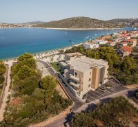 A recreational apartment in Sevid by the sea, surrounded by greenery and a beach.
