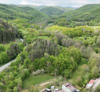 Aerial view of green wooded lands in Turová ideal for living.