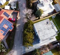 Aerial view of family houses on Slnečné jazerá juh street in Senec.