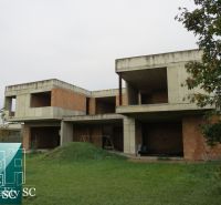 An unfinished family house in Kráľová pri Senci - Záhumenská in Senec, surrounded by greenery.
