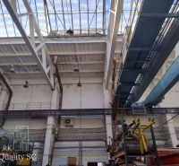 Interior of warehouses and halls with construction and lighting.