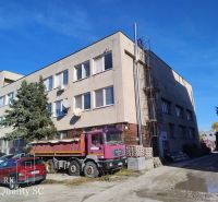 Building and truck on Staviteľská Street in Bratislava III, in the Warehouses and Halls section.