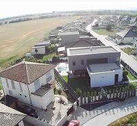 Plots - living in Senec with a view of the surrounding nature and modern houses.